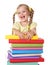 Child holding pile of books.