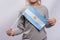 Child holds the flag of Argentina in his hands. Close up