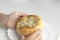 child holds treat in his hands. Patties with cheese and herbs. Russian pastry vatrushka