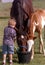 Child with Horses