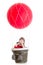 Child on hot air balloon watching through spyglass