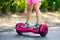 Child on hover board. Kids ride scooter.