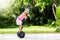 Child on hover board. Kids riding scooter