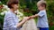 Child Hygiene. Woman cleaning child`s hands with a wet baby wipe