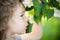 Child with jasmin flower