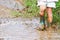 Child Jumping in Mud Puddle