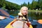Child kayaking on the river