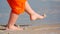 Child Kicking Sand