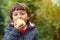 Child kid eating apple fruit outdoor autumn fall nature healthy