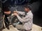 Child labour - Child at working in tyre shop in Pakistan