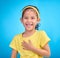 Child laugh, happy portrait and smile of a little girl in a studio with blue background feeling cute. Happiness