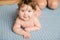 The child learned to crawl. Cute happy smiling baby. Newborn baby, little girl learns to crawl. Family, new life, childhood, the