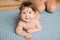 The child learned to crawl. Cute happy smiling baby. Newborn baby, little girl learns to crawl. Family, new life, childhood, the