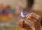 The child lighting the matches. The fire in the hands of a child. Dangerous situation at home. A small child plays with matches, a