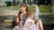 Child, little girl eating ice cream on a hot, torrid summer day, children near the fountain