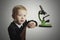 Child.little scientist.little boy in tie.Schoolboy working with a microscope.Education