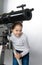 Child Looking Into Telescope Star Gazing Little girl