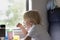 Child lunch in the train carriage. Travel by railway