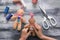 Child making felt Christmas toys at wooden table