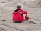 Child making sand castles