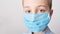 Child in medical mask. Coronavirus and Air pollution pm2.5 concept. Virus symptoms. Concept of epidemic, influenza, protection