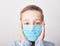 Child in medical mask. Coronavirus and Air pollution pm2.5 concept. Virus symptoms. Concept of epidemic, influenza, protection