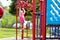 Child on monkey bars. Kid at school playground