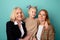 Child with mother and grandmother together smiling and hug isolated.