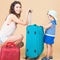Child with mother ready to travel