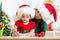 Child and mother writing christmas letter to Santa Claus