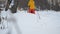 Child with Musher Riding in Husky Dogs Sledge