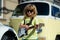 Child musician playing the guitar like a rockstar outdoor. Kid boy rock musician with guitar. Portrait of a funny child