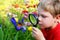 Child observing a butterfly