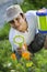 Child observing nature with a magnifying glass