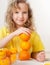 Child with oranges