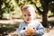 Child and oranges, boy picks oranges, fruit orange grove, organic farm, Israel