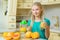 Child with oranges. Girl squeezed fresh orange