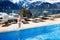 Child in outdoor swimming pool of alpine resort