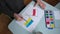 A child paints the flags of Poland and Ukraine