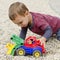 Child palying with toy car