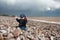 Child on a pebble beach in Devon, England