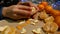 Child peels tangerines