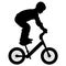 Child performs a trick on a bike, silhouette vector.