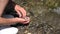 Child Picking River Stone by Mountain Waterfall, Tourist Kid Playing in Water, Girl Hands in Spring Stream Hiking at Camping Trip