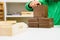 Child placing some blocks to count numbers is his house, concept of homeschooling