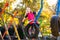 Child on playground in autumn. Kids in fall.