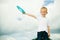 Child in playground kid in action boy playing with frisbee