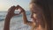 Child Playing on Beach, Kid Watching Sea Waves, Girl Makes Heart Shape Love Sign