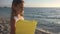 Child Playing on Beach in Sunset, Kid Watching Sea Waves, Girl View at Sundown