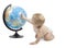 Child playing with globe